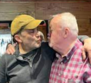 Cllr Simon Boone having a good snog with Cllr Ernie Welch